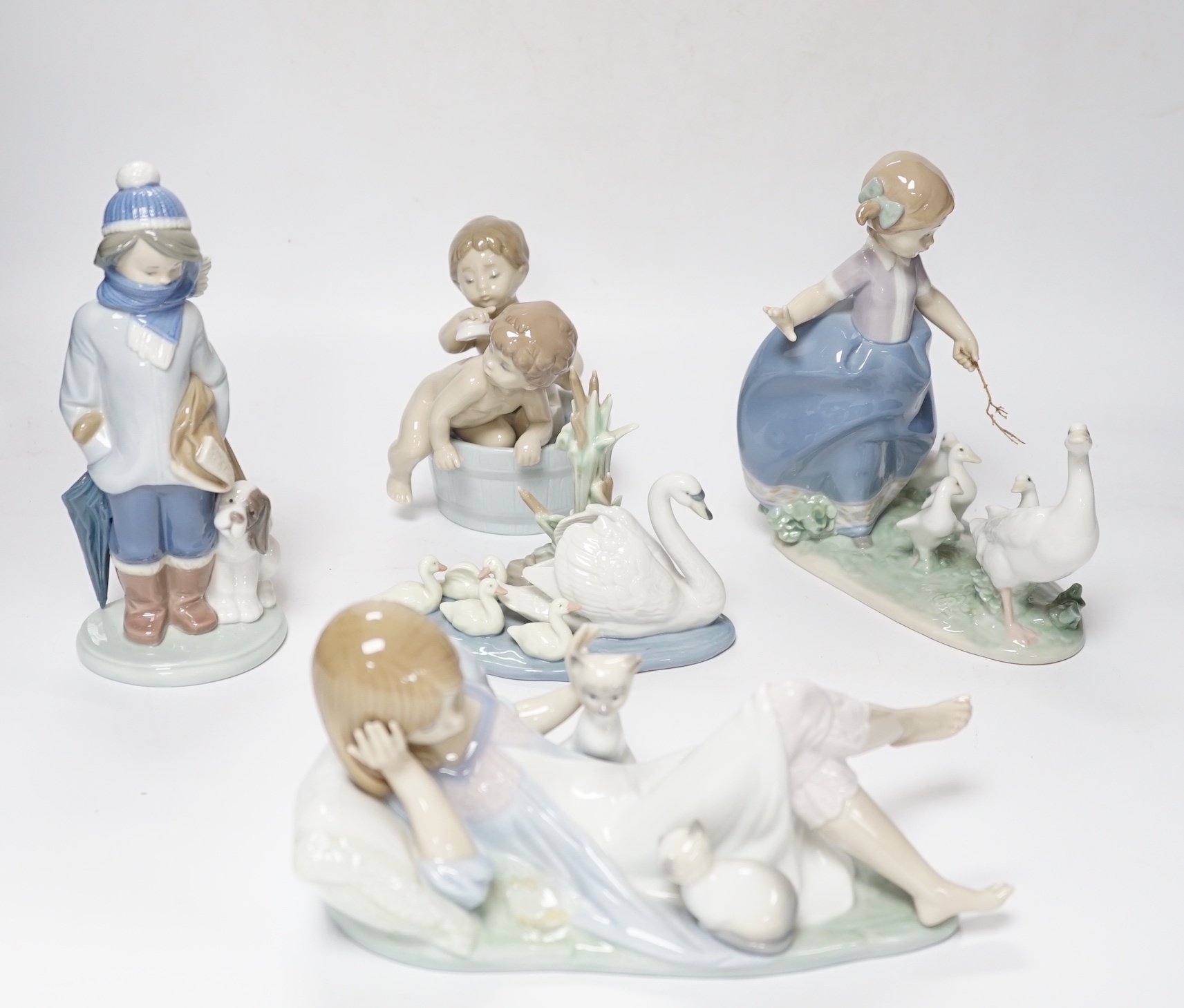 Five Lladro figure groups, Follow Me, Hurry Up, Bathtime, Interrupted Nap and another, four boxed